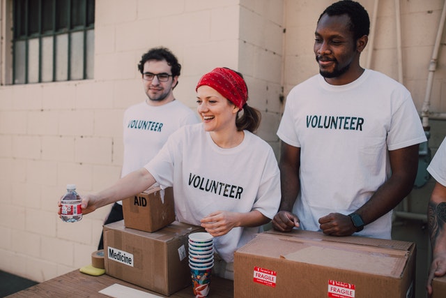 Volunteers handing out water