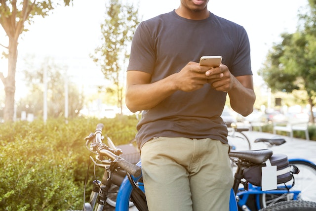 Man typing on phone